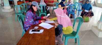 Penyaluran Bantuan Pangan CBP Desa Wonoharjo Kepada Masyarakat.